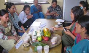 Mothers at center learning about good nutrition