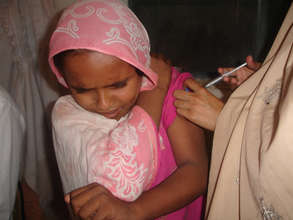 Receiving a  vaccination
