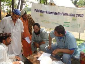 Dr Babar runs a medical relief camp