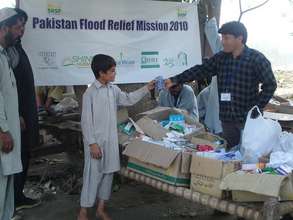 This young man receives  refreshment