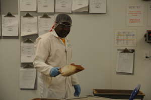 Freeman measures out the dry ingredients.