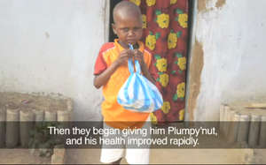 Nico with his weekly supply of Plumpy'Nut