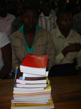 Unity, the librarian, receives some new books.