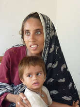 Photo: ActionAid. Saeed Bibi and her son
