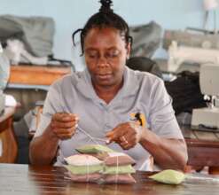Michelle tying sachet sets together