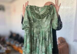 Threads of Hope students show off tailoring work