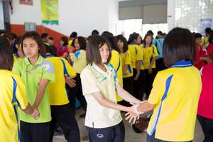 Grade-nine school girls learning self-defense