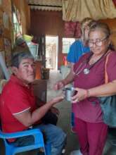 Patient receiving treatment on a home visit