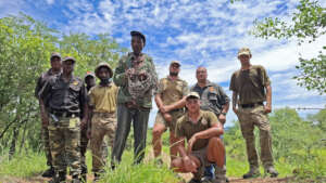 Team with apprehended poacher and removed snares.