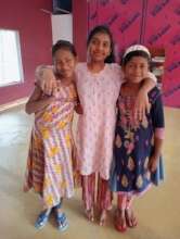 A big girl caring for our two younger sisters.