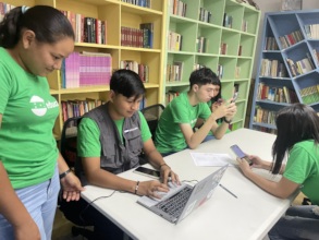 Josue leading his group on an editing project