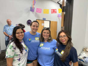 Smiling faces from the Kidsave team