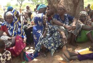Refugees under the trees