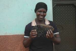 Shakira with one of the bee wax she harvested
