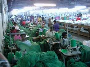 Women weaving bednets
