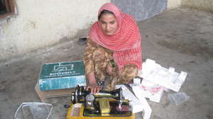 Landmine survivor learning to sew