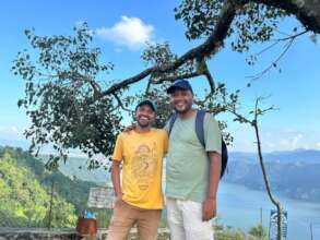 Travel partner visiting our project and village