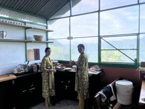 Womens started preparing food from new kitchen