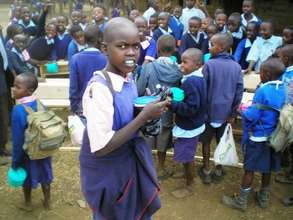 Celebrating the donation of desks