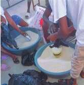 Rice and beans are given to each child