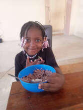 Little girl eats food