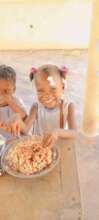 Little girl eats food