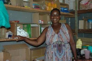This women runs a grocery shop in busy center