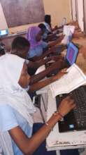 Students copying poetry text