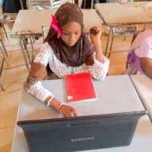Hadiza enjoys her new learning companion