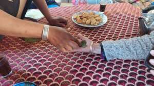 Participants celebrating using Henna