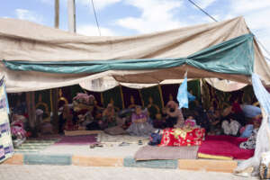 Women gathering in a temporary safe space.