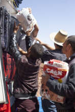 Aid being distributed to a hard to reach village.