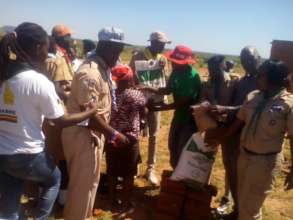Scouts Distributing Food And Clothing