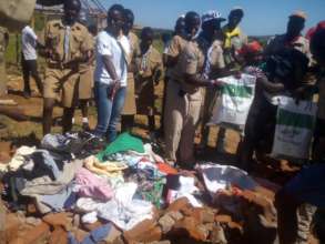 Scouts Distributing Food And Clothing