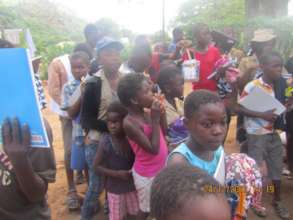Kids In Rimbi Village Receiving School Supplies