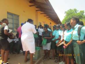 Distributing Masks To Rimbi High School