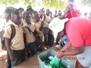 Distributing Masks To Rimbi High School Students