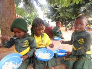 Kids At Our Preschool Eating Porridge