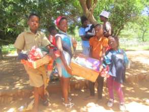 Kids Receiving School Supplies