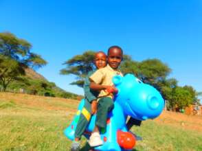 Kids Riding Bikes And Playing With Toys