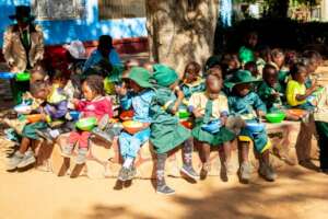 Kids At Our Primary School Eating Porridge