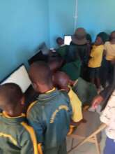 Students Getting Basic Computer Training
