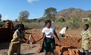 Our Scouts at Workcamp building a house