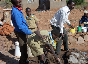 Our Scouts at Workcamp building a house