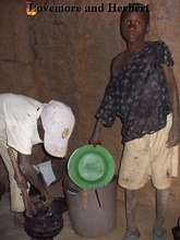 Lovemore and Herbert getting ready to have dinner