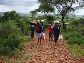 Caregivers delivering food and clothing