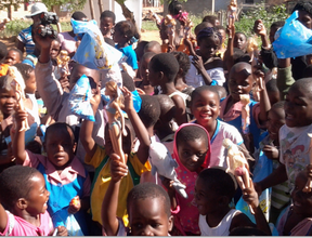Kids receiving toys during Christmas