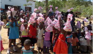 Kids receiving toys during Christmas