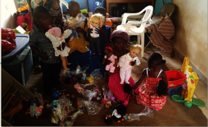 Kids Playing With Toys Donated To Pre-school