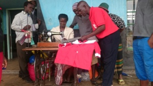 Rural Youth Receiving Sewing Lessons